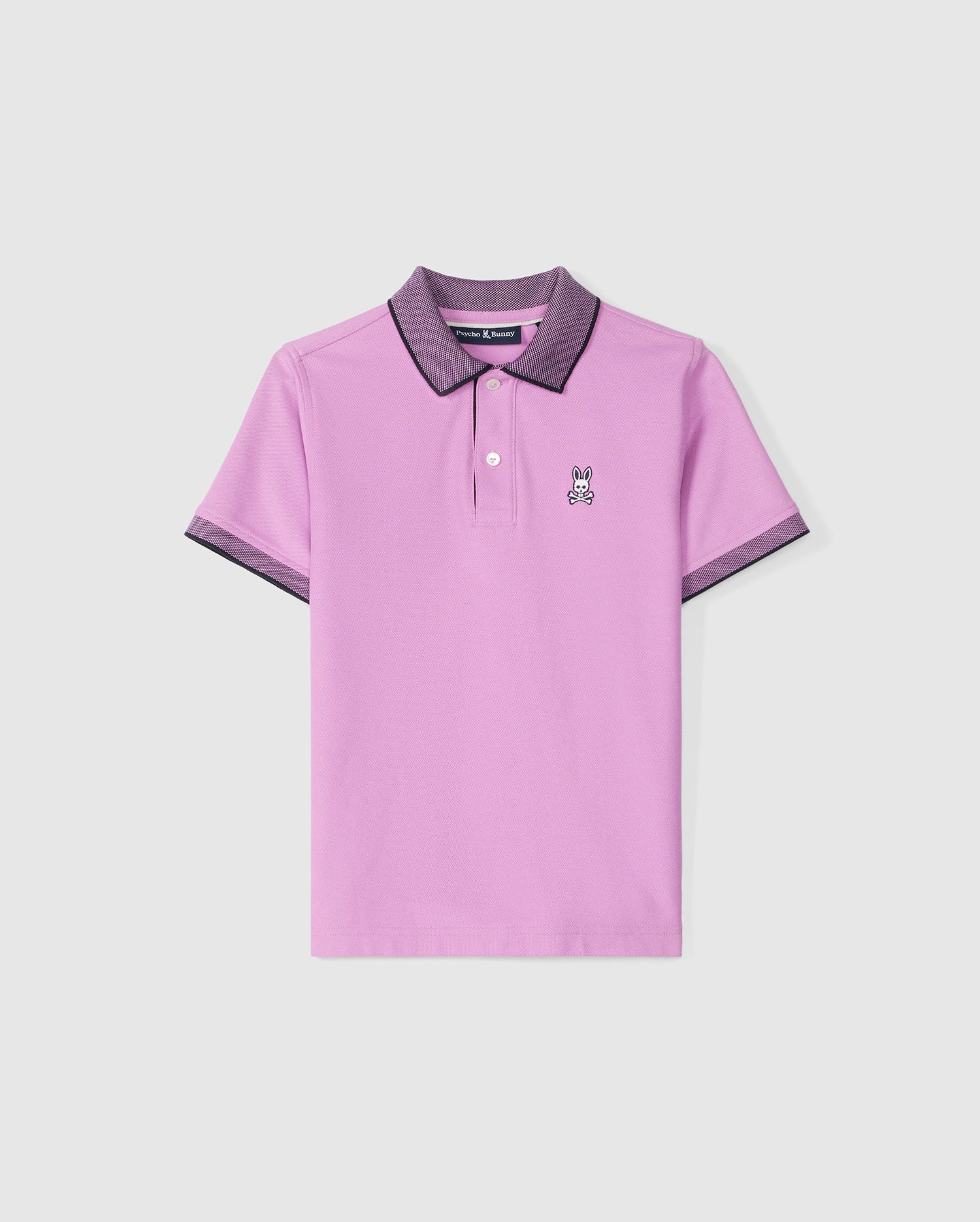 A short-sleeved, light purple Psycho Bunny KIDS SOUTHPORT PIQUE POLO SHIRT (B0K263B200) with a dark collar and dark trim on the sleeves. The shirt features a small embroidered bunny logo on the left side of the chest, perfect for kids.