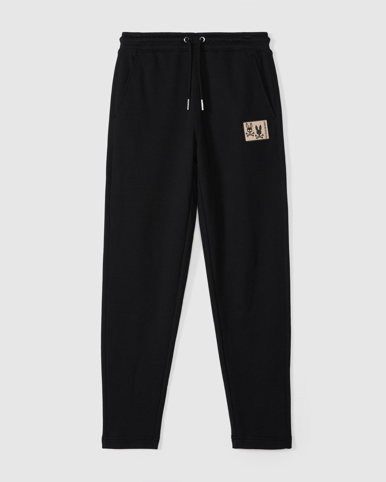 Psycho Bunny's KIDS MONROE TWILL PATCH FLEECE SWEATPANT (B0P929D200) is made from black cotton fleece and features a drawstring waist. The pants have a twill Bunny patch with an artistic design on the upper left leg, luxury finishes, a straight-leg cut, and are perfect for casual wear.