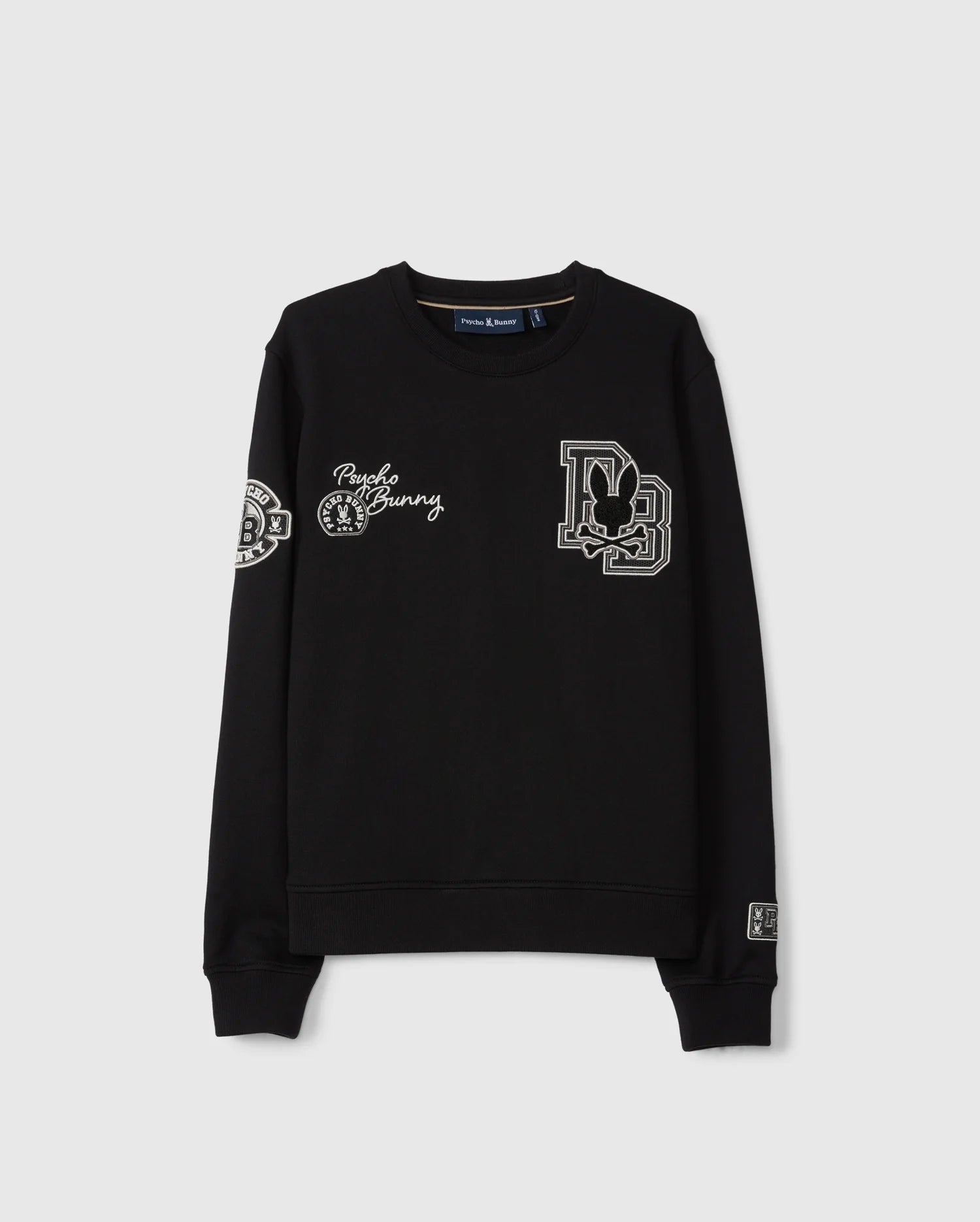 The KIDS ZACK VARSITY SWEATSHIRT - B0S880D200 by Psycho Bunny is a black, regular fit, long-sleeve varsity sweatshirt featuring embroidered designs. The front showcases a 