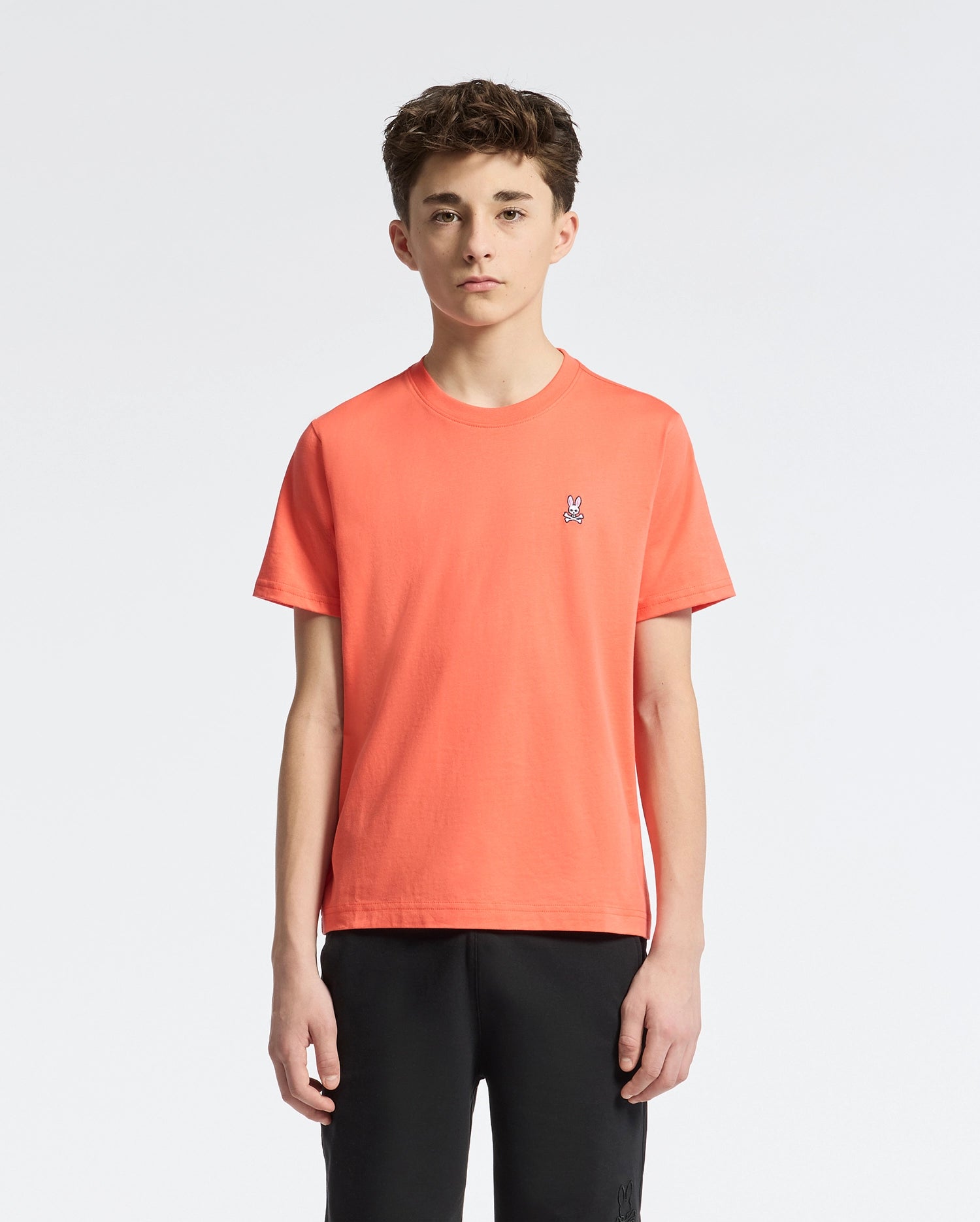 Teen | Kids' Classic Crew Neck Tee in hot coral by Psycho Bunny, featuring a soft cotton design and embroidered logo for a bold, stylish look.