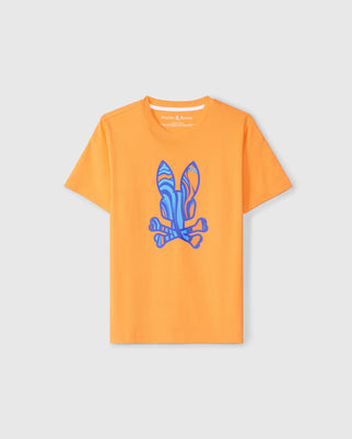 The KIDS NEVADA GRAPHIC TEE - B0U515C200 is an orange T-shirt that features a vibrant swirl-patterned Bunny print in blue and light grey hues on the front. The design resembles floral shapes with curved lines. Made of soft Pima cotton, it has the brand name "Psycho Bunny" printed on the inside neckline.