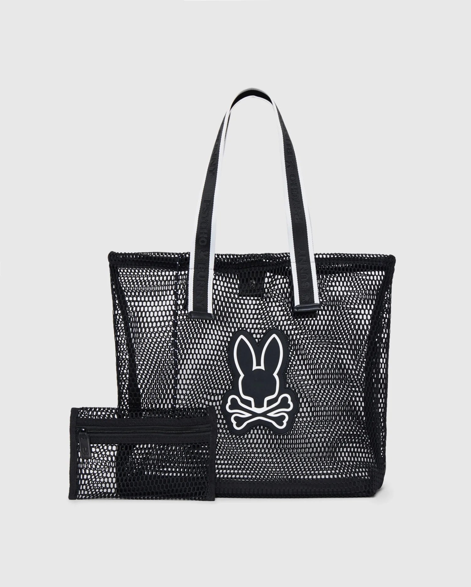 The Psycho Bunny MENS MESH TOTE BAG - B6A388B200 is a black mesh tote bag with double shoulder handles adorned with logo-webbing straps. It features a large printed design of a bunny head with crossbones below it and comes with a matching removable small black mesh zippered pouch. The handles also have a distinctive white stripe running through the center.