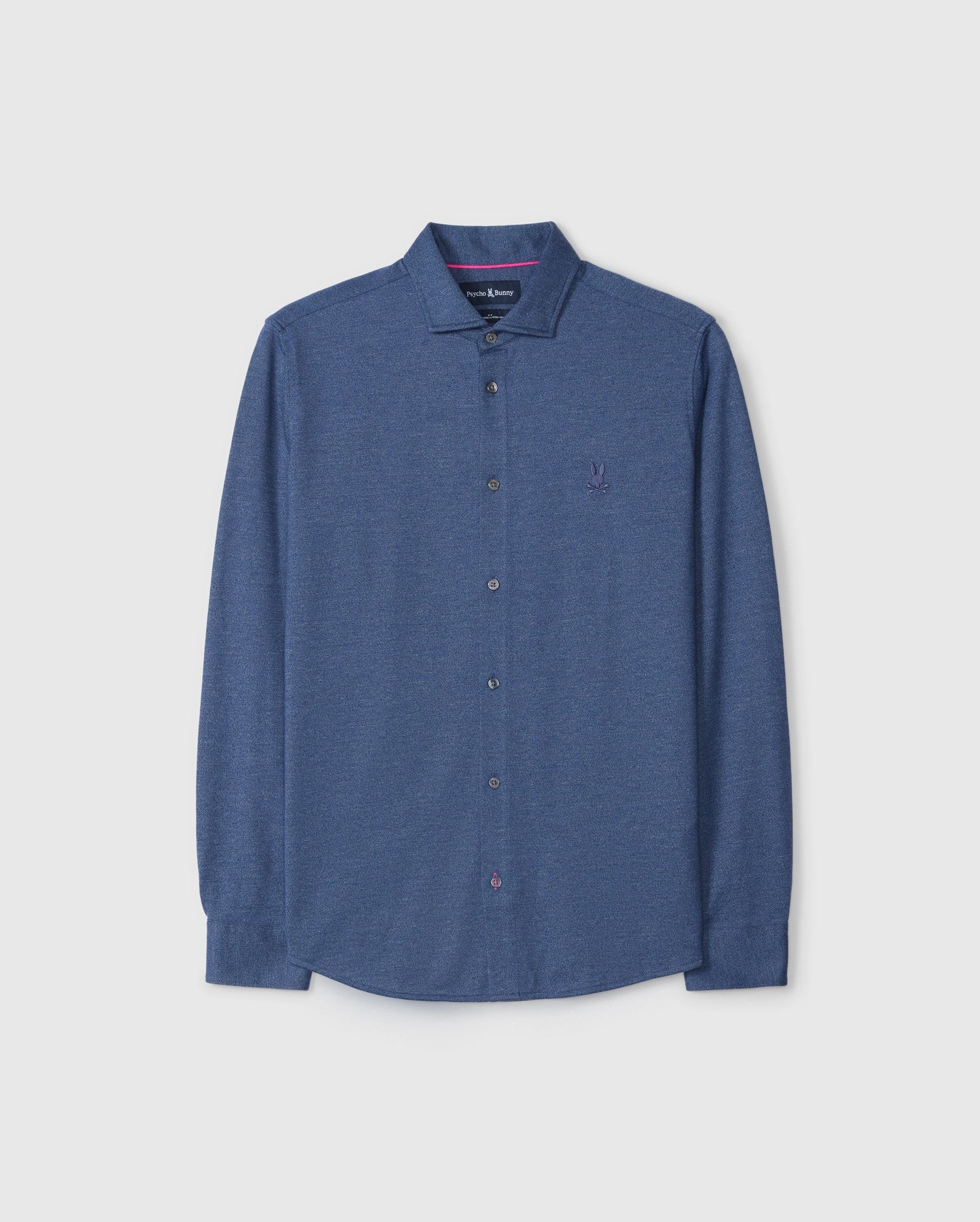 A blue long-sleeved button-up men's cotton shirt with a collar, featuring dark buttons and an embroidered logo on the left chest area. Made from premium knit Peruvian Pima cotton, the fabric has a slight texture. The Psycho Bunny MENS DALTON KNIT SHIRT - B6C747D200 is displayed on a plain white background.