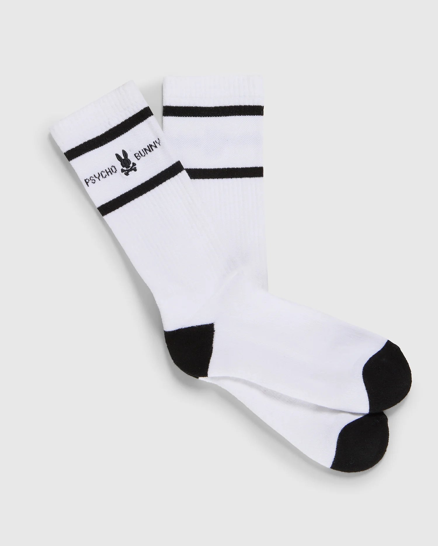 A pair of MENS FASHION SOCKS - B6F484B200 made from luxurious Pima cotton, featuring white with black toe and heel sections, two black horizontal stripes near the top, and a black bunny logo with the text 