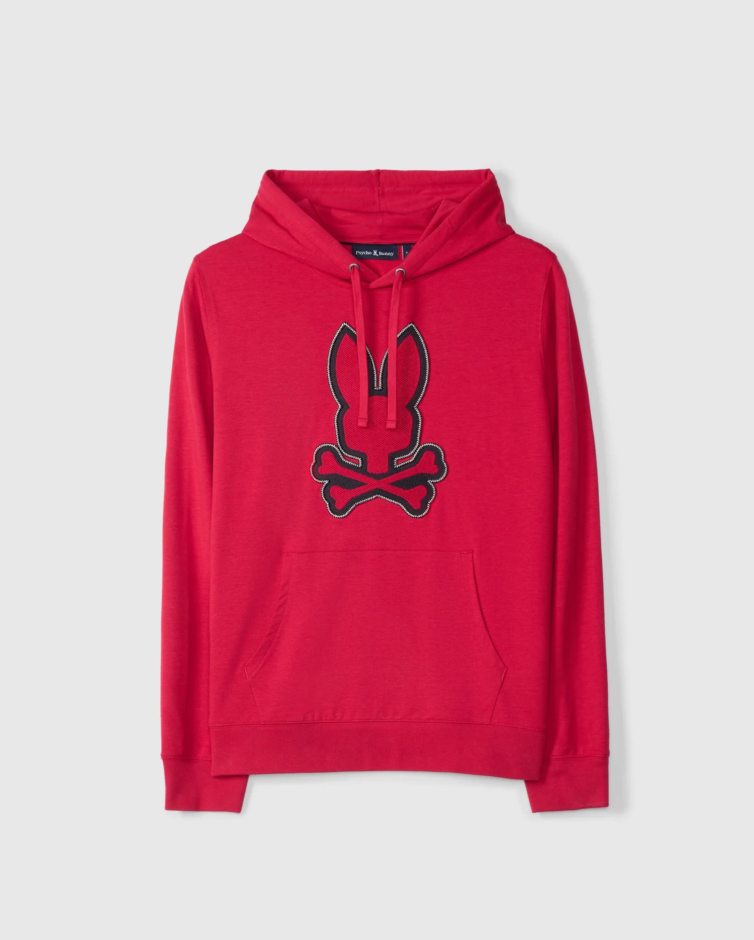 The MENS WALTER LIGHTWEIGHT HOODIE - B6H476D200 by Psycho Bunny is a vibrant red hooded sweatshirt crafted from soft Micro French Terry. It features a black outline of a bunny head over crossed bones on the front, along with a front pouch pocket, long sleeves, and ribbed cuffs and hem for added comfort.