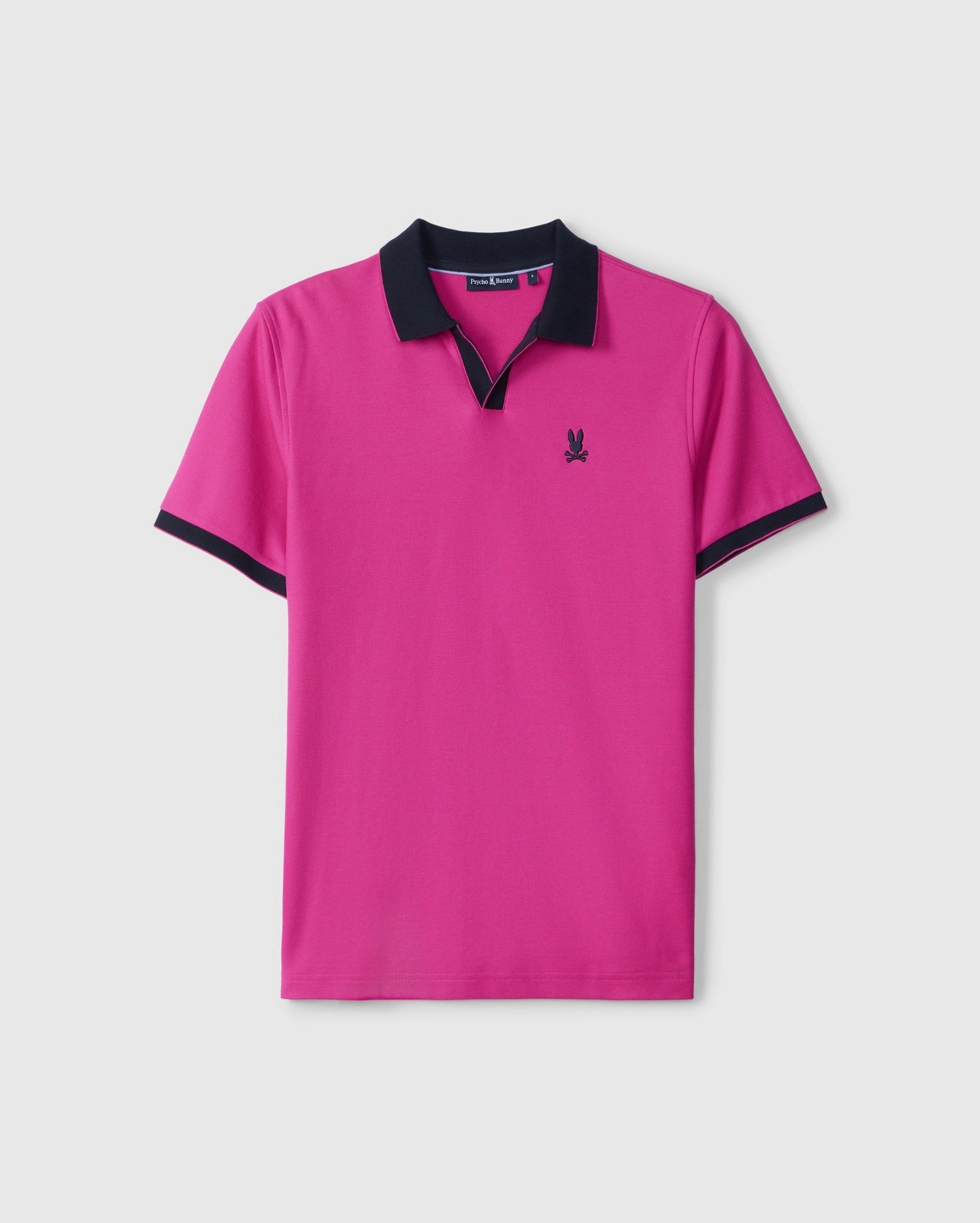 A pink short-sleeve Psycho Bunny Richards Johnny Collar Pique Polo Shirt (B6K641C200) with black trim on the collar and sleeve cuffs. This regular fit polo shirt boasts a small black embroidered logo on the left chest. The classic Johnny collar and smooth, lightweight Pima cotton fabric complete the look against a plain white background.