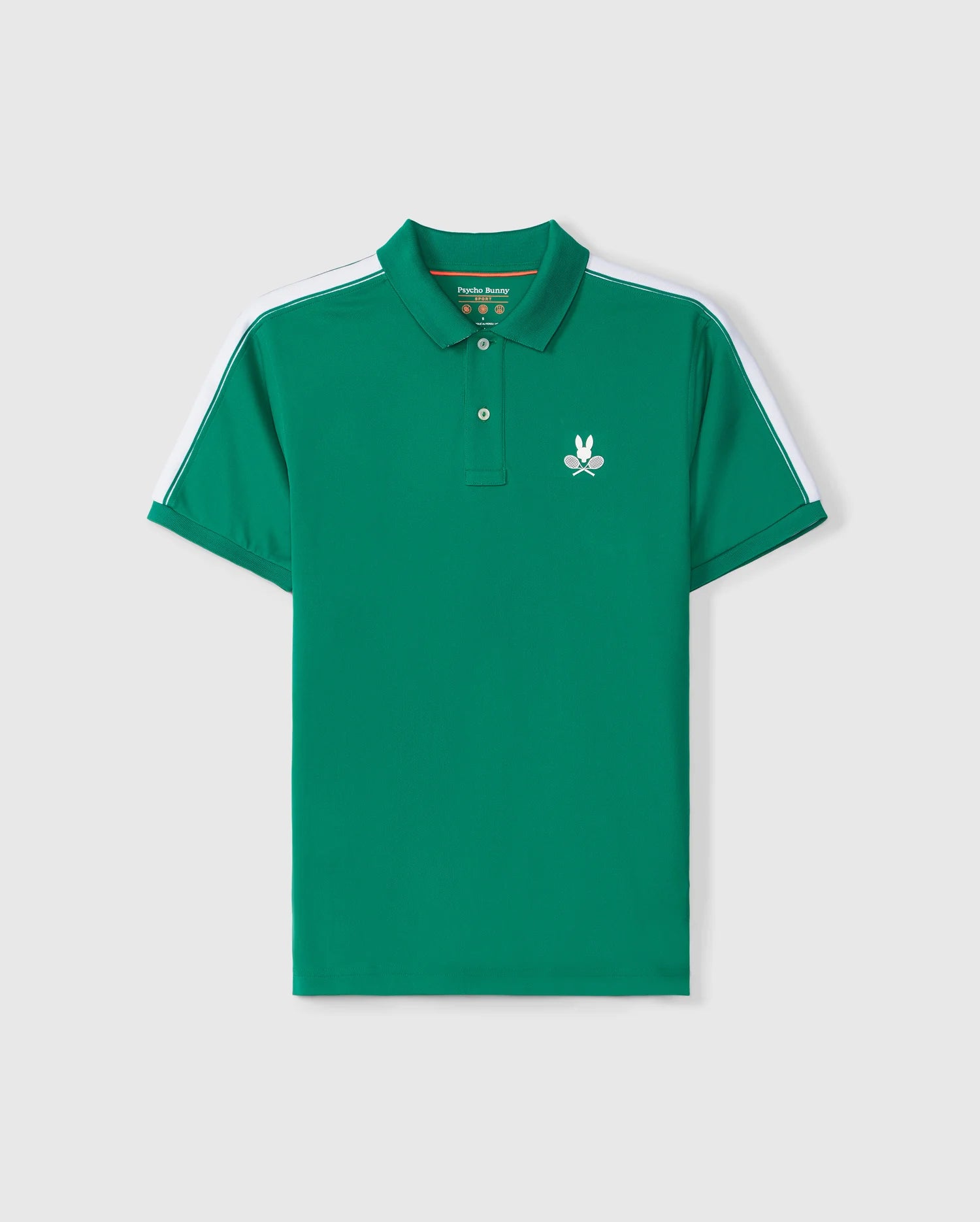 The MENS COURTSIDE SPORT POLO - B6K693C200 by Psycho Bunny is a green polo featuring white shoulder stripes, a rib knit collar, and a buttoned placket. It showcases a distinctive white embroidered Bunny logo on the chest, depicting a rabbit holding two tennis rackets. This stylish shirt also includes short sleeves.