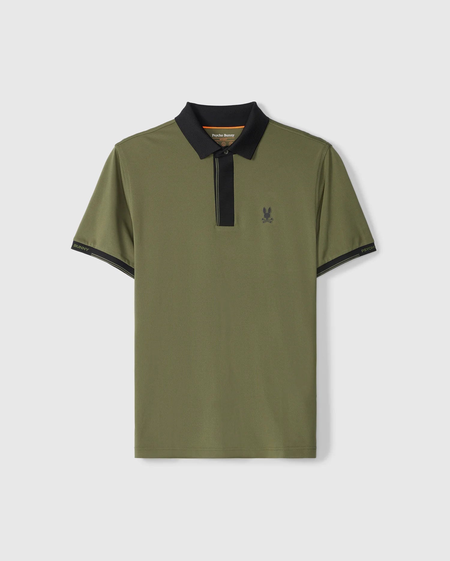 The MENS EDMONDS SPORT POLO SHIRT - B6K906D200 by Psycho Bunny is a khaki green sport polo shirt with a dark collar and dark trim at the sleeve edges. It features a small embroidered emblem on the chest, tech pique fabric for breathable performance, and a zipper instead of buttons.