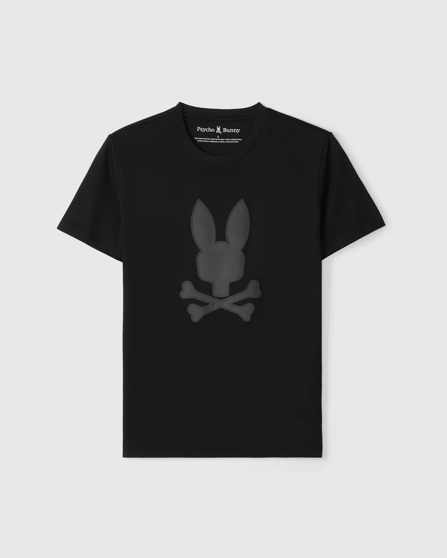 Black Psycho Bunny Pima cotton t-shirt displayed on a plain background, featuring a centered graphic of a stylized bunny head above crossed bones in a muted grey color.