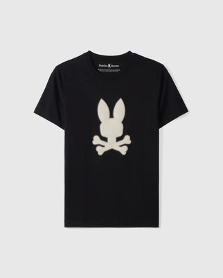 Crafted from luxurious Peruvian Pima cotton, the Psycho Bunny Mens Riviera Graphic Tee - B6U639C200 features a black, short-sleeve design with a crew neckline. It showcases a distinctive graphic of a bunny with long ears above crossed bones, reminiscent of a skull and crossbones, and the brand name Psycho Bunny is printed on the inside collar.