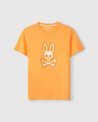 The Psycho Bunny MENS KAYDEN GRAPHIC TEE, B6U676C200, is an edgy orange Pima cotton top featuring a centered white skull with upright bunny ears and crossed bones beneath.