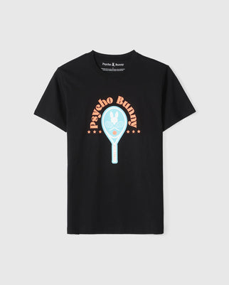 The black Psycho Bunny Courtside Graphic Tee (B6U682C200) features a large tennis-themed image with a light blue racket and the bunny skull logo. "Psycho Bunny" is highlighted in orange, flanked by stars, all on premium Pima cotton jersey for superior comfort.