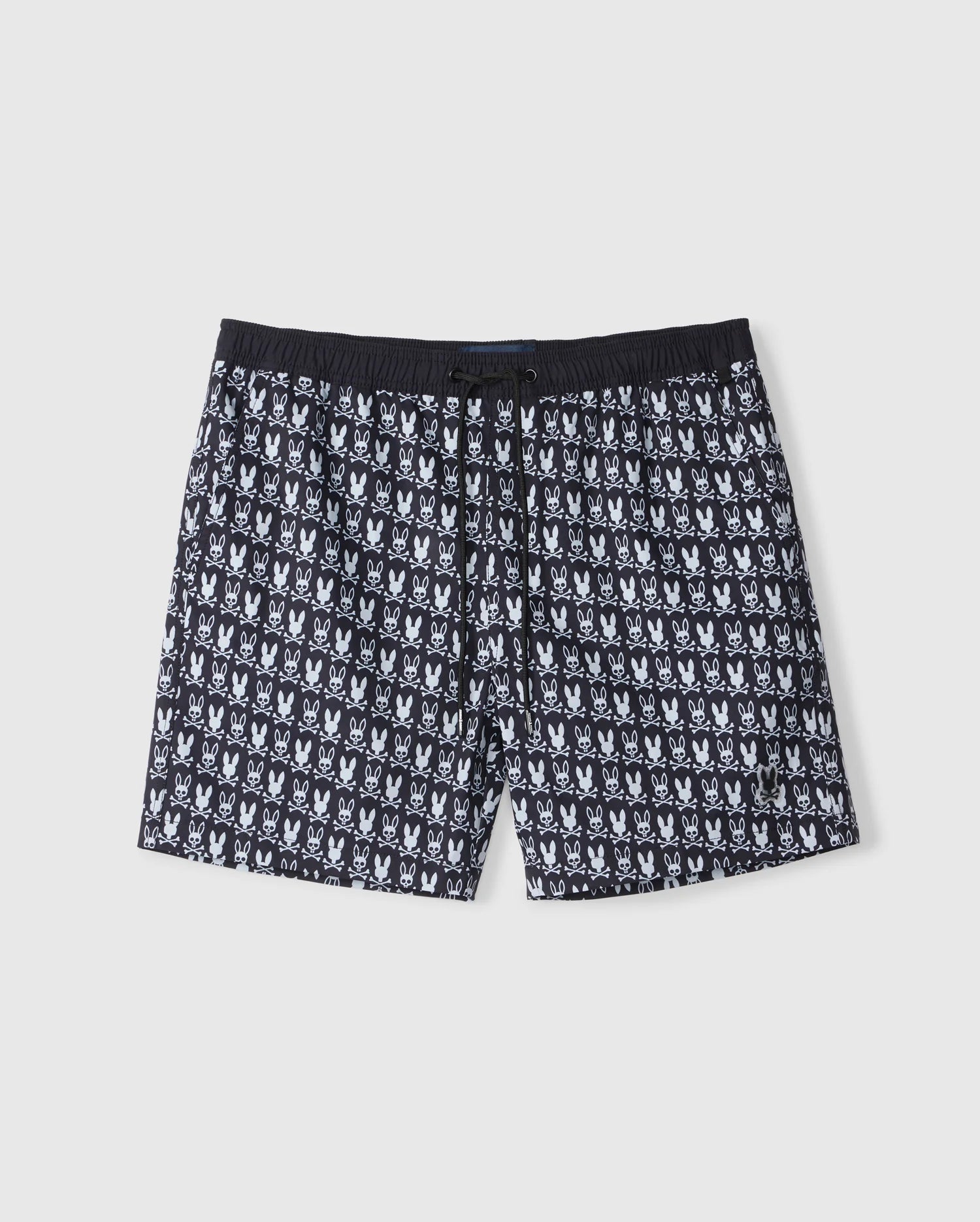 The MENS TILDEN PRINT SWIM TRUNK - B6W729D200 by Psycho Bunny showcases a stylish black bunny print on a crisp white background. These quick-dry swim trunk shorts feature an elastic waistband with an adjustable drawstring, making them perfect for any water adventure.