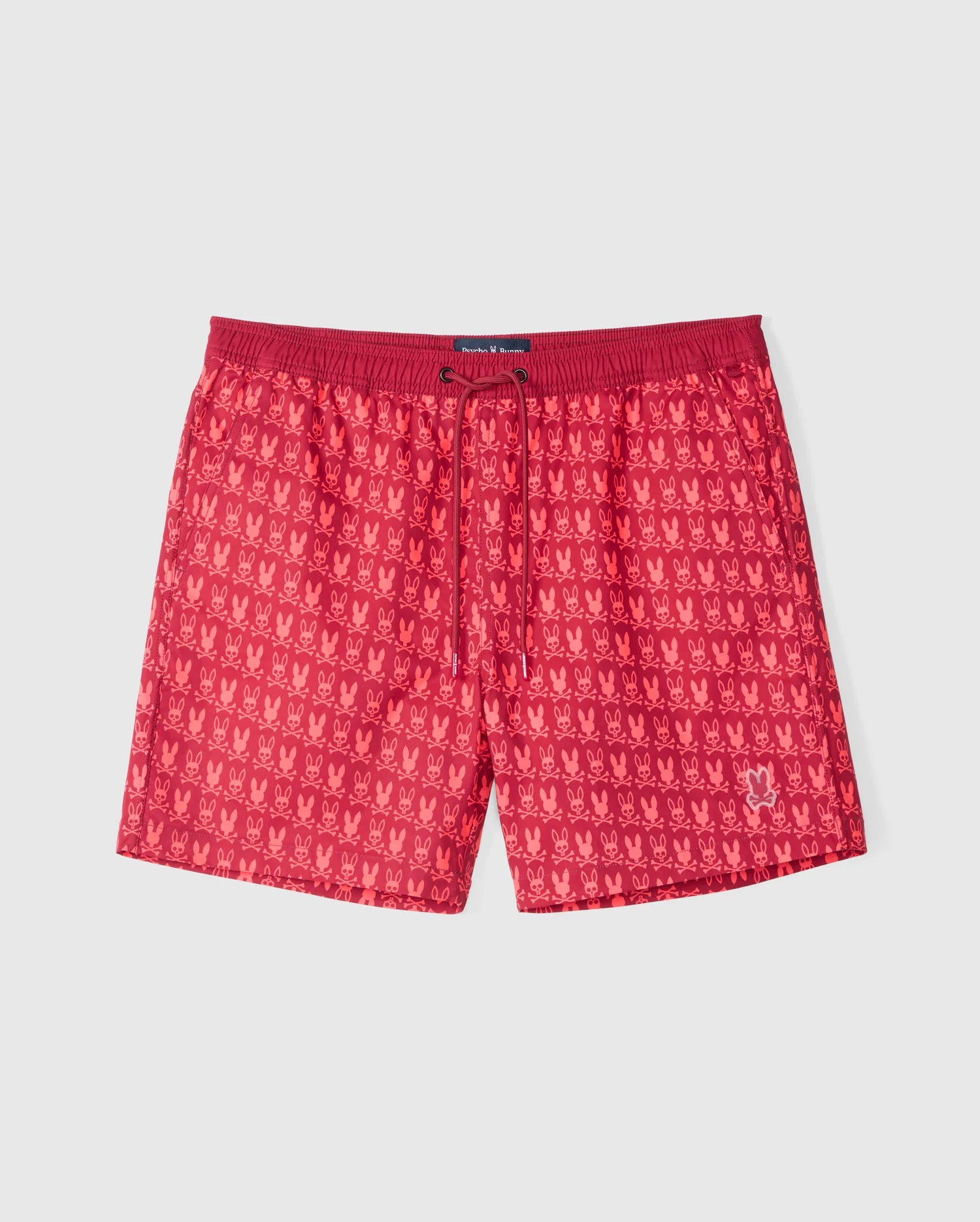 The Psycho Bunny Men's Tilden Print Swim Trunk (B6W729D200) features a vibrant red background adorned with a tiny all-over white pattern of repeating logos. These trunks come equipped with an elastic waistband and an adjustable drawstring for the perfect fit, as well as a small logo on the lower right leg. Designed for optimal comfort and performance, they also include a quick-dry membrane.