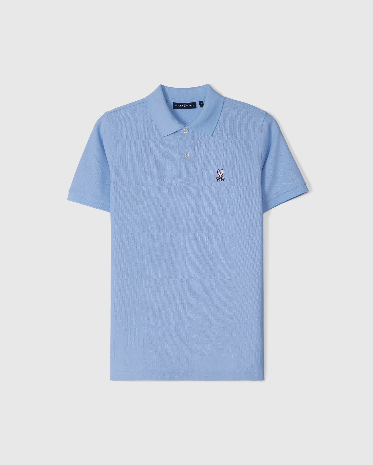 The Psycho Bunny Men's Classic Pique Polo Shirt (B6K001B200) is a light blue shirt made from breathable Pima cotton. It features a small embroidered bunny logo on the left chest, a classic collar, and a two-button placket against a plain white background.