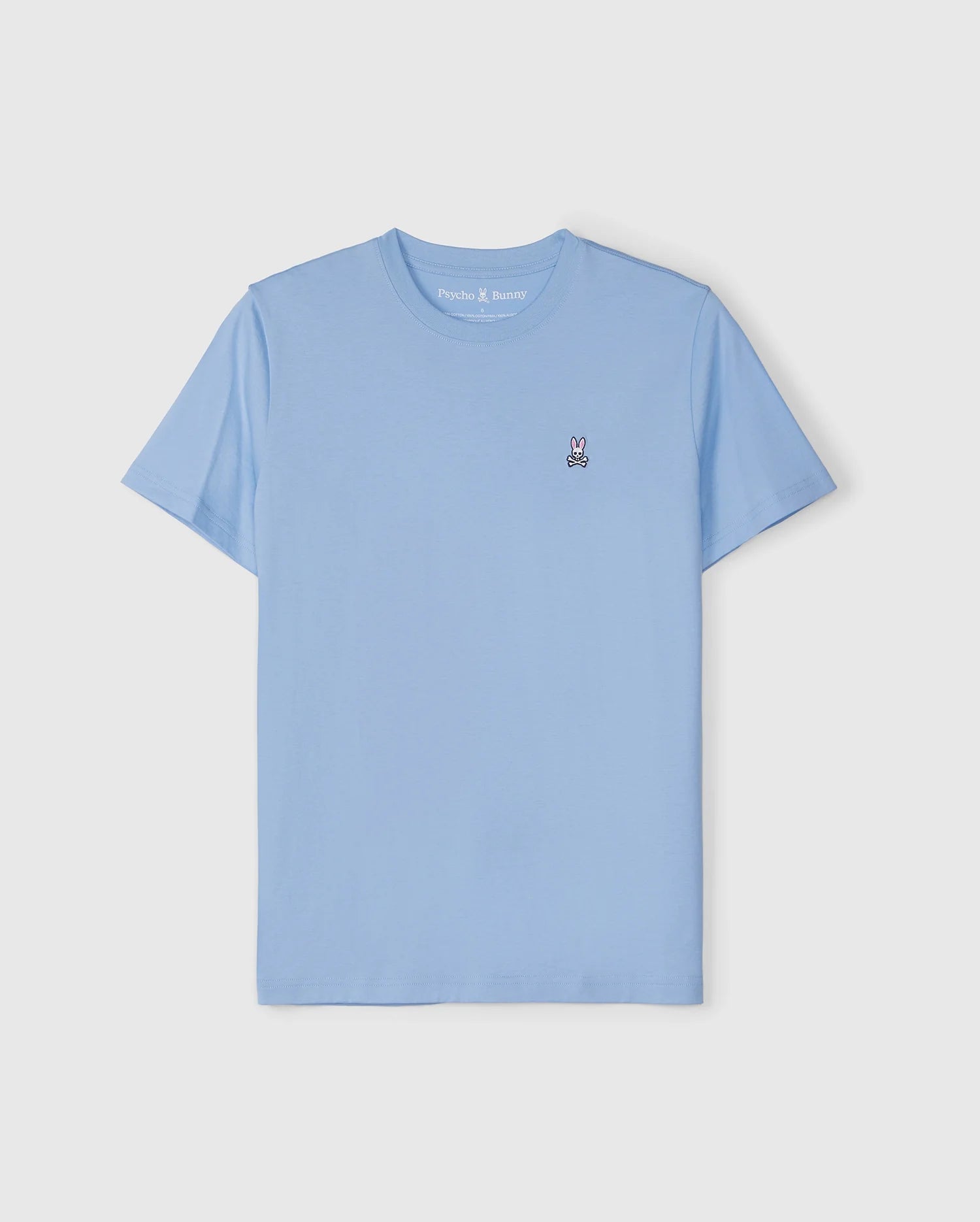 A Psycho Bunny light blue men's classic crewneck tee (product code: B6U014B200) is displayed against a plain white background. Made from premium Pima cotton, the T-shirt features a small embroidered bunny logo in white and black on the left chest side. The round neckline and short sleeves contribute to its vibrant look.