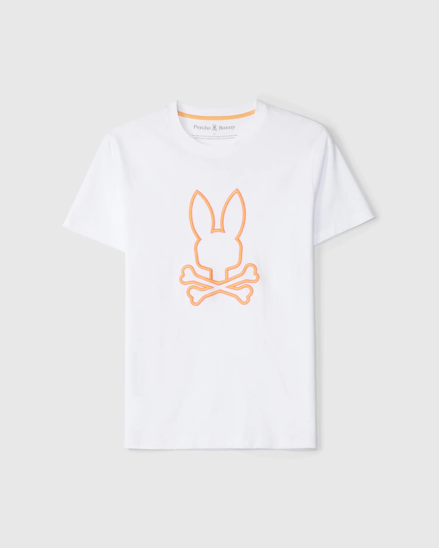 The MENS FLOYD GRAPHIC TEE - B6U338B2TS by Psycho Bunny is a white t-shirt crafted from 100% Pima cotton, featuring a minimalist design with an orange embroidered Bunny outline and crossbones underneath, all against a plain gray background that enhances its sleek look.