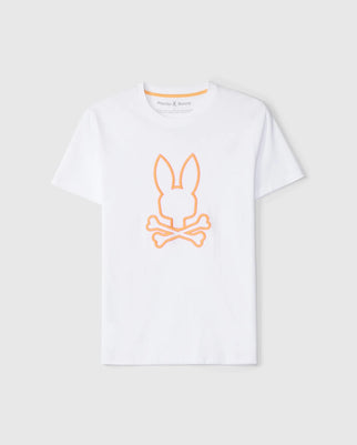 The MENS FLOYD GRAPHIC TEE - B6U338B2TS by Psycho Bunny is a white t-shirt crafted from 100% Pima cotton, featuring a minimalist design with an orange embroidered Bunny outline and crossbones underneath, all against a plain gray background that enhances its sleek look.